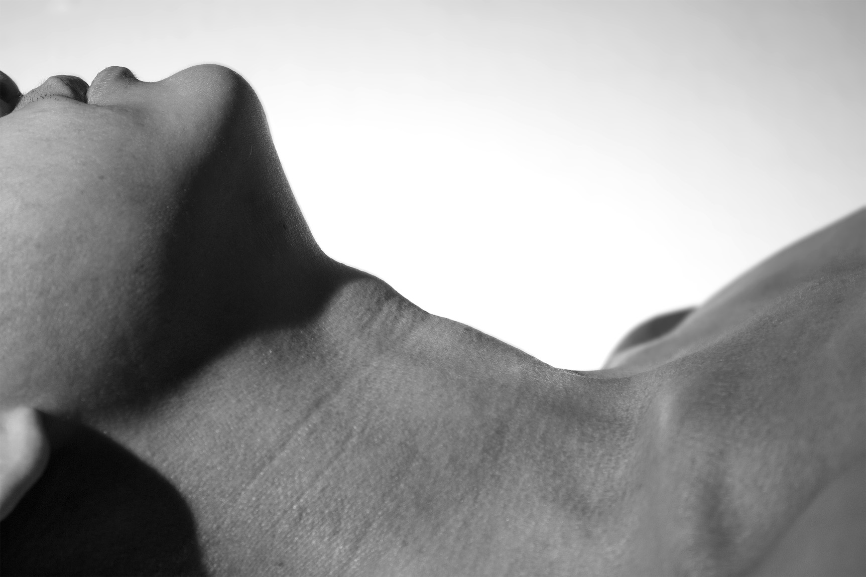 hannah kim's photograph of a woman's neck and chin in profile