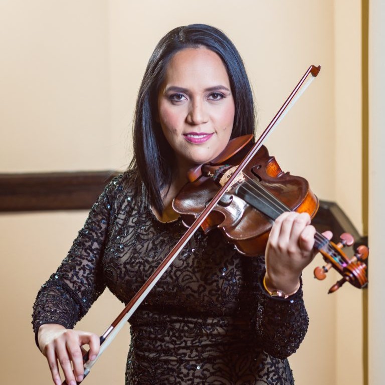Woman smiling playing violin